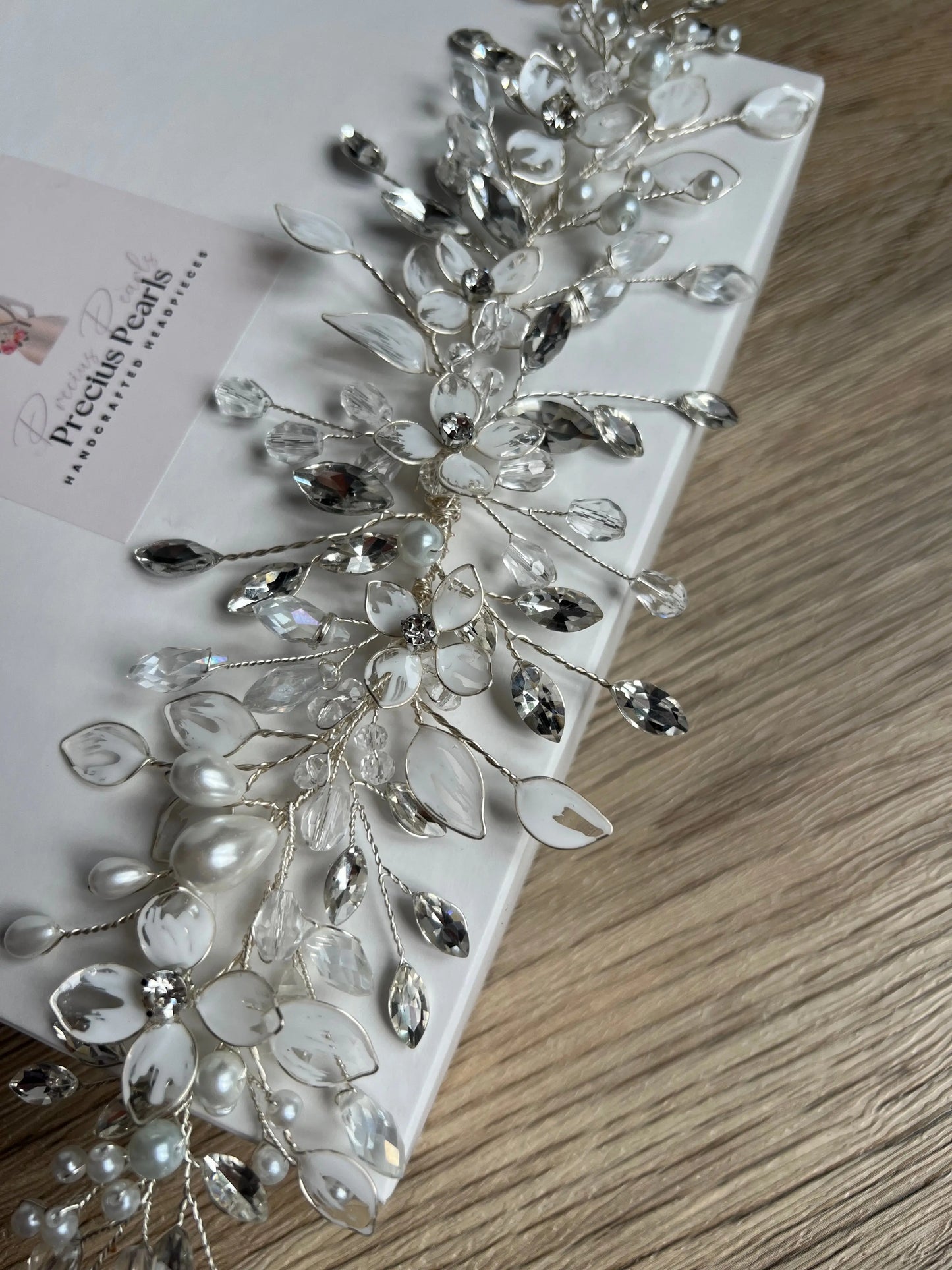Delicate bridal vine with flowers and leaves Delicate bridal vine with flowers and leaves Precius pearls
