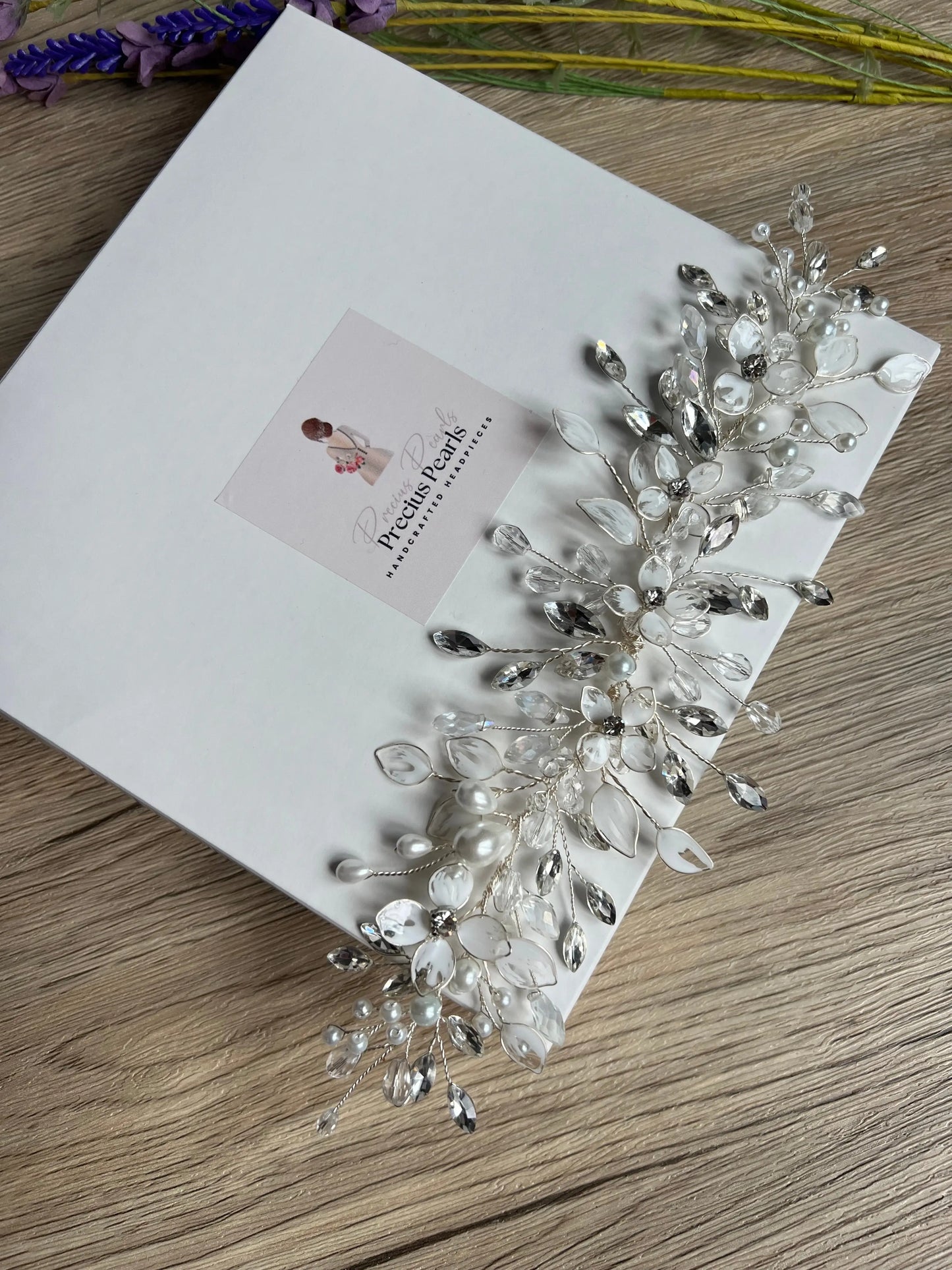 Delicate bridal vine with flowers and leaves Delicate bridal vine with flowers and leaves Precius pearls