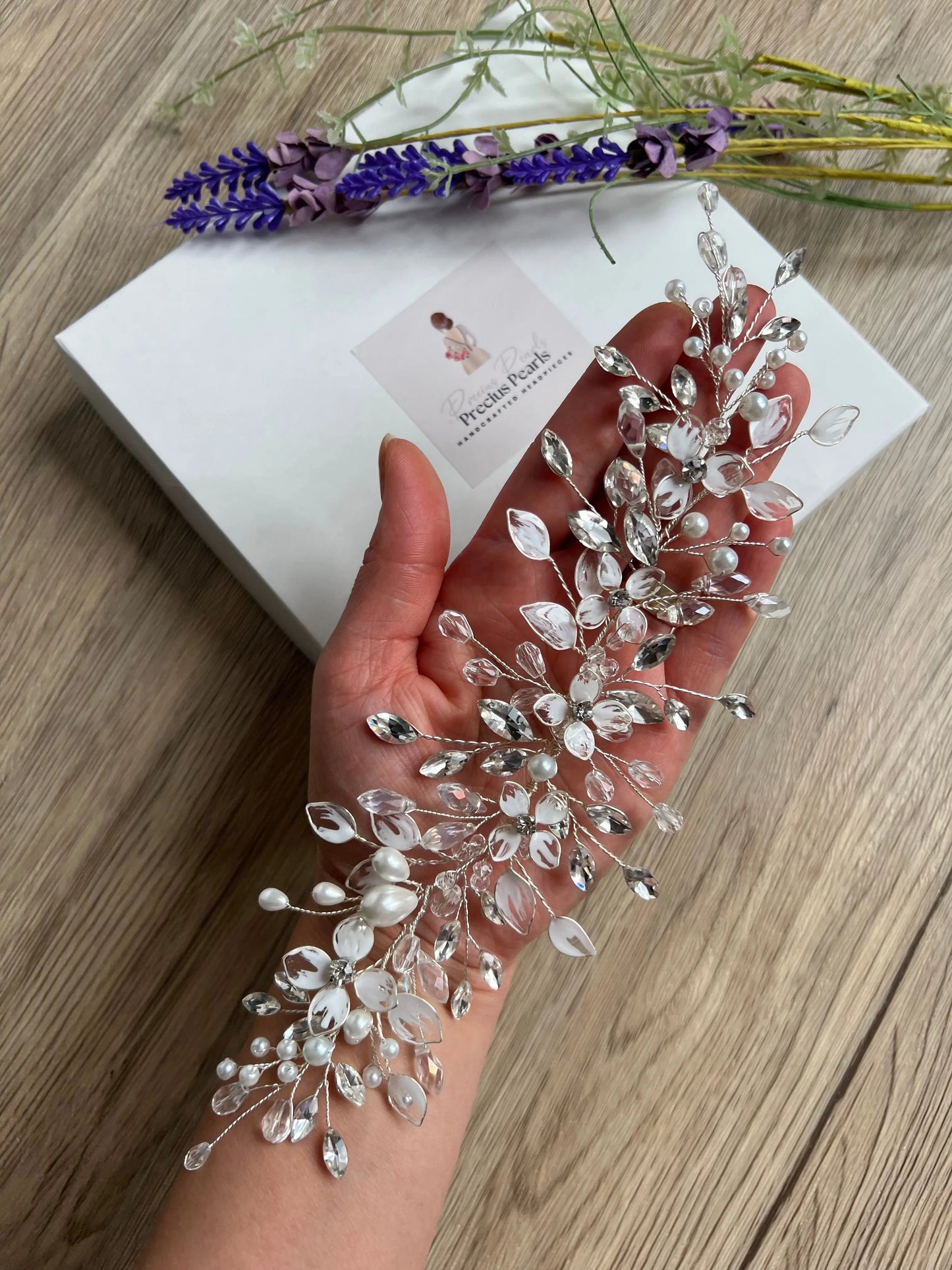 Delicate bridal vine with flowers and leaves Delicate bridal vine with flowers and leaves Precius pearls